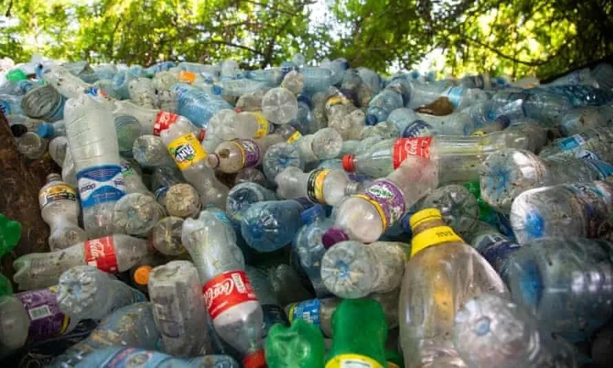 A pile of plastic beverage containers.