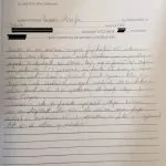 Fotografie a unei cereri scrise de mână.